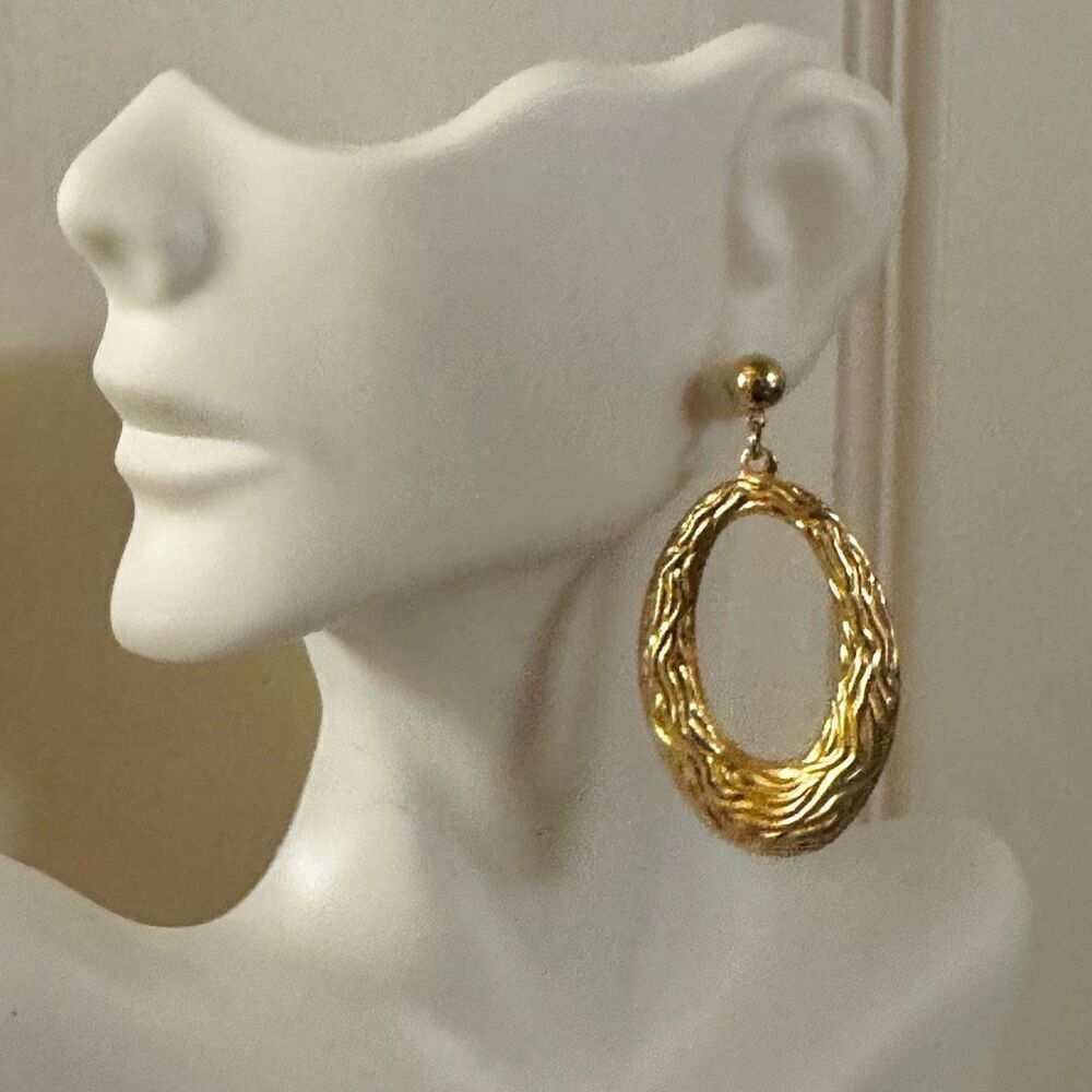 Gold tone oval textured drop earrings